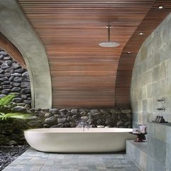 Awesome Modern Outdoor Bathroom With Oval Bathtub And Natural Rock - Karbonix