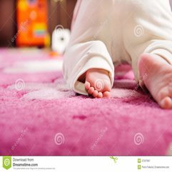 Baby Crawling On Pink Carpet Royalty Free Stock Photography - Karbonix