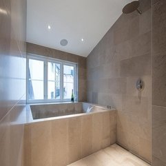Bathtub Placed Under Glazed Window Creamy - Karbonix