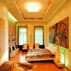 Bed Room Interior Design With Big Wall Painting Wooden Floor Looks Elegant - Karbonix
