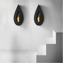 Black Teardrop Fireplace In Flame Wall With Clean White Staircase Fantastic Idea - Karbonix