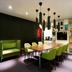 Chairs For Woooden Table Placed Under Black Tube Chandelier In Green - Karbonix