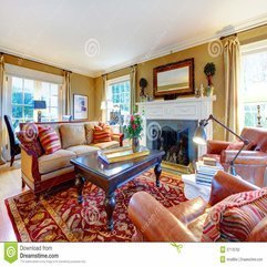 Charming Family Room With Old Style Furniture And Fireplace Stock - Karbonix