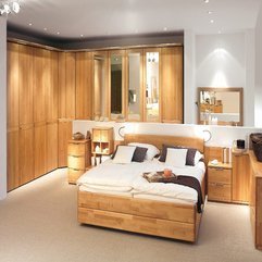 Comfortable Bedroom With Wooden Cabinets Tables And Furniture - Karbonix