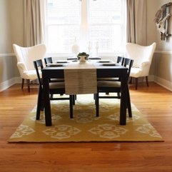 Comfortable Dining Room Design With Yellow Rug On Wooden Flooring - Karbonix
