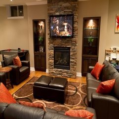 Cozy Home Theater Idea At Basement With Stone And Fireplace Design - Karbonix