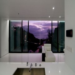 Cushions Viewed From Kitchen Overlooking Outside View Through Glazed Window White Sofa - Karbonix