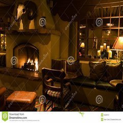 Dark Lounge And Cozy Fireplace Royalty Free Stock Photography - Karbonix