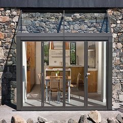 Dining Room With Glass Wall Kitchen - Karbonix