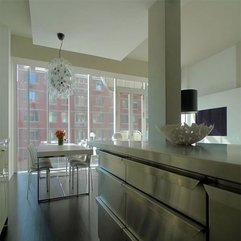 Dining Table With Orange Flower From Glossy Silver Kitchen White Chairs - Karbonix