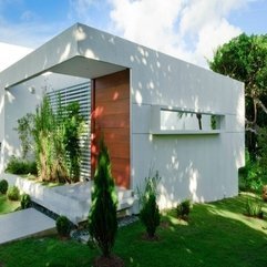 Door With Green Garden Surrounding Front View - Karbonix