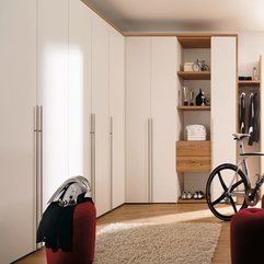 Door Wooden Wardrobe With Cool White Cycling Helmets Red Couch Minimalist White - Karbonix