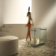 Dual Aspect Fireplace With Chic White Couch And Fur Rug Minimalist Screen - Karbonix