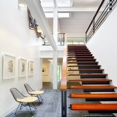 Front Of White Wall Near Orange Wooden Floor Small Chairs - Karbonix
