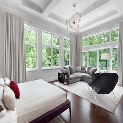 Gray Sofa White Bedding Spacious Room - Karbonix