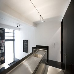 Grey Kitchen Table Near Black Cabinets Glossy - Karbonix