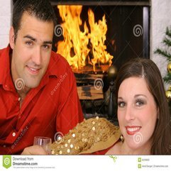 Happy Gorgeous Couple In Front Of Fireplace Stock Photo Image - Karbonix