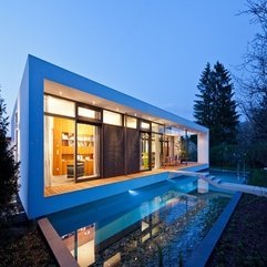 Home Inside Viewed Through Glass Wall Completed With Small Pond In Courtyard - Karbonix