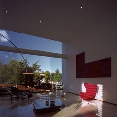 Living Room Placed Under Brown Painting Red Chair - Karbonix