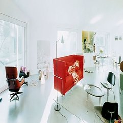 Living Room With Strong Vibrant Red Sofa Matched With Modern Lightings - Karbonix