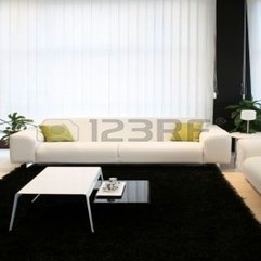 Living Room With White Sofa And Black Carpet Royalty Free Stock - Karbonix