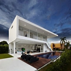 Lounge Chairs Placed On Wooden Floor Near Infinity Pool Modern Black - Karbonix