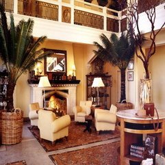 Mantel With Palm Trees Decorate Fireplace - Karbonix
