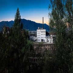 Mount Background And Sun Dawn Hotel Building - Karbonix