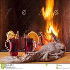 Mulled Wine At Cozy Fireplace Firelight Only Royalty Free Stock - Karbonix