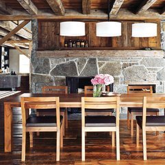 On Wooden Dining Table Backrounded With Exposed Stone Pattern Pinky Roses - Karbonix