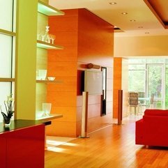 Orange Wall With Chic Modern Red Sofa Also Wooden Parquet Wall In Green - Karbonix