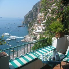 Patio Rooms With Blue White Pattern Chair Picturesque Cliffs View Looks Fancy - Karbonix