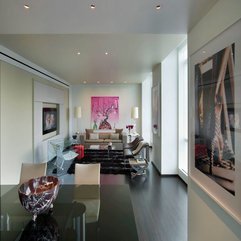 Pink Painting On White Wall Viewed From Dining Room Lounge Space - Karbonix