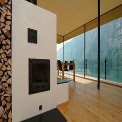 Placed In White Wall Near The Timber Storage Fireplace - Karbonix