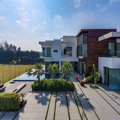 Plants Near Blue Swimming Pool In Home Courtyard In Green - Karbonix