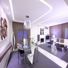 Room Equipped With Fancy White Black White Chairs With Glazed Table Dining Room - Karbonix