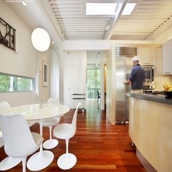 Room Equipped With White Chairs Oval Table Under Rounded Chandelier Dining Room - Karbonix