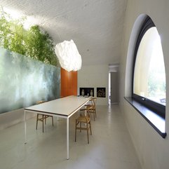 Room Equipped With Wooden Chairs And White Table Under White Chandelier Minimalist Dining - Karbonix