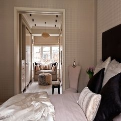 Sofa With Dark Brown Cushions Placed Near Glazed Window Creamy - Karbonix