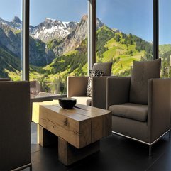 Sofa Wooden Table Placed Near Glazed Wall With Mountain View Grey - Karbonix