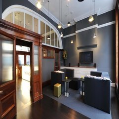 Sofas Wall With Vintage Wooden Door Chic Chandeliers In Gray - Karbonix