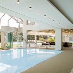 Steel Stairs Next To Indoor Swimming Pool Curved - Karbonix