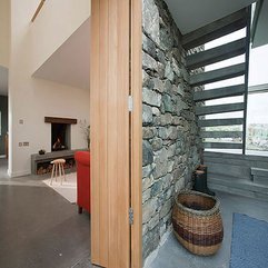 Stone Walls With Wood Door Fireplace - Karbonix
