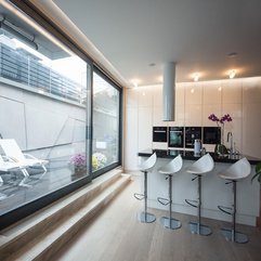 Stools Near Transparent Glass Window White Bar - Karbonix