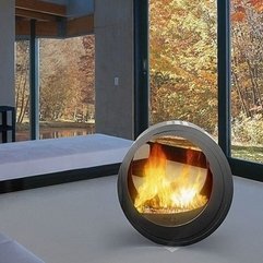 Striking Indoor Fireplace With Round Design For Amazing Living - Karbonix