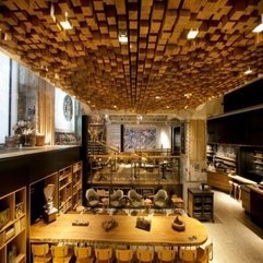 Table At Starbucks Cafe In Amsterdam With Featured Ceiling Wooden Dining Room - Karbonix