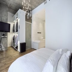 White Minimalist Bedroom Design With Small Walk In Closet Design - Karbonix