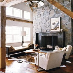 White Sofas Beside Black Steel Fireplace Framed In Craftiness Exposed Stone Cottony - Karbonix