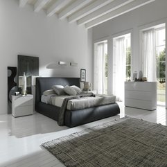 Best Inspirations : White Themed Bedroom Design With Cozy Black Bed Simple Rug Fascinating Design - Karbonix