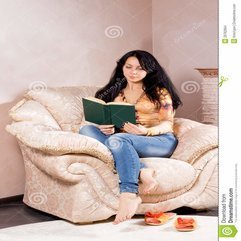 Best Inspirations : Woman Curled Up In An Armchair Reading Stock Images Image 29762664 - Karbonix